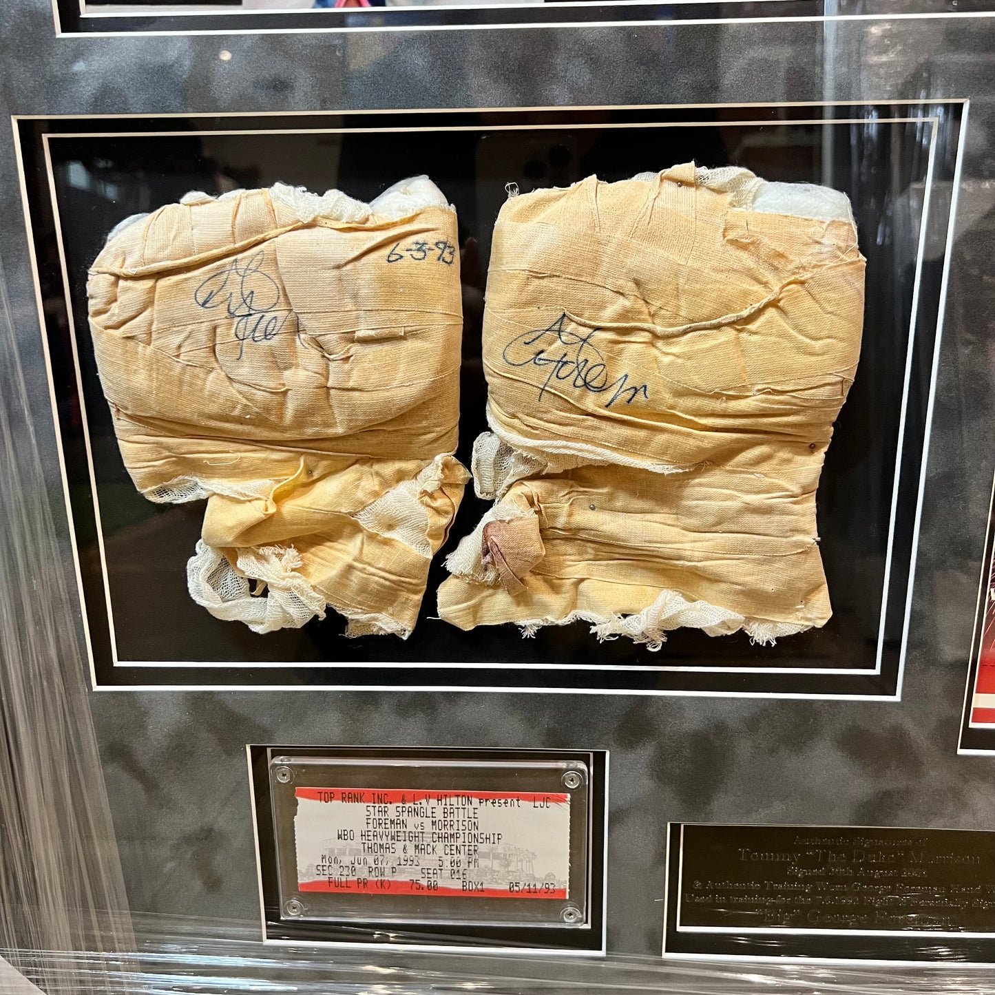 Tommy Morrison and George Foreman Signed Hand Wraps