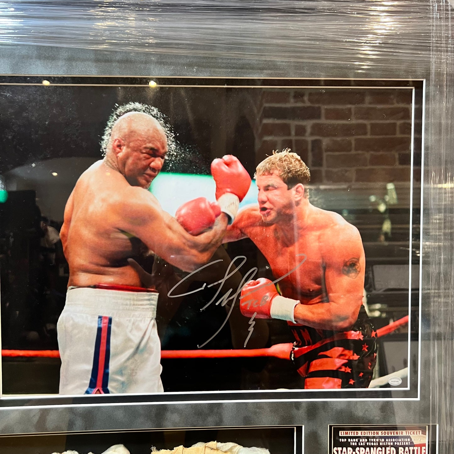 Tommy Morrison and George Foreman Signed Hand Wraps